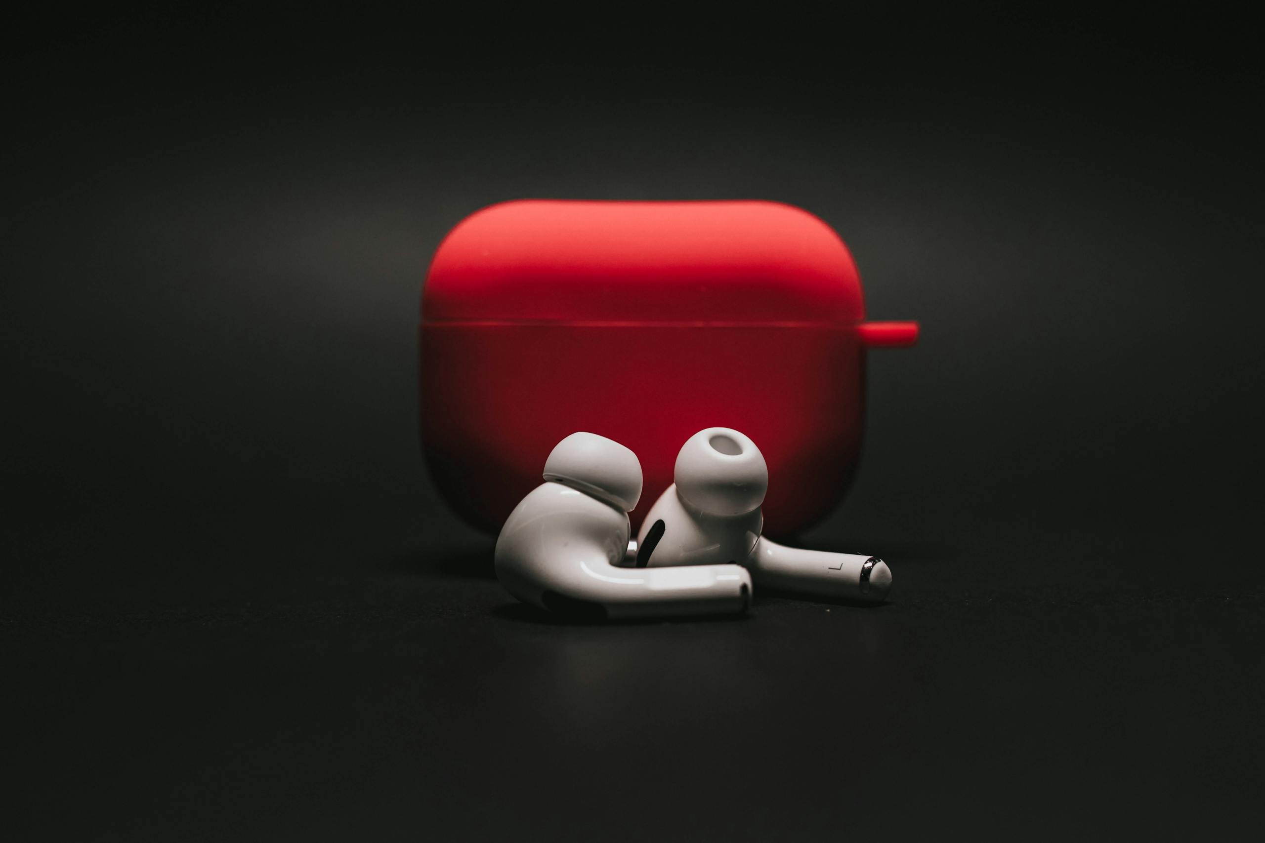 Modern audio technology device with sleek minimalist design on dark surface