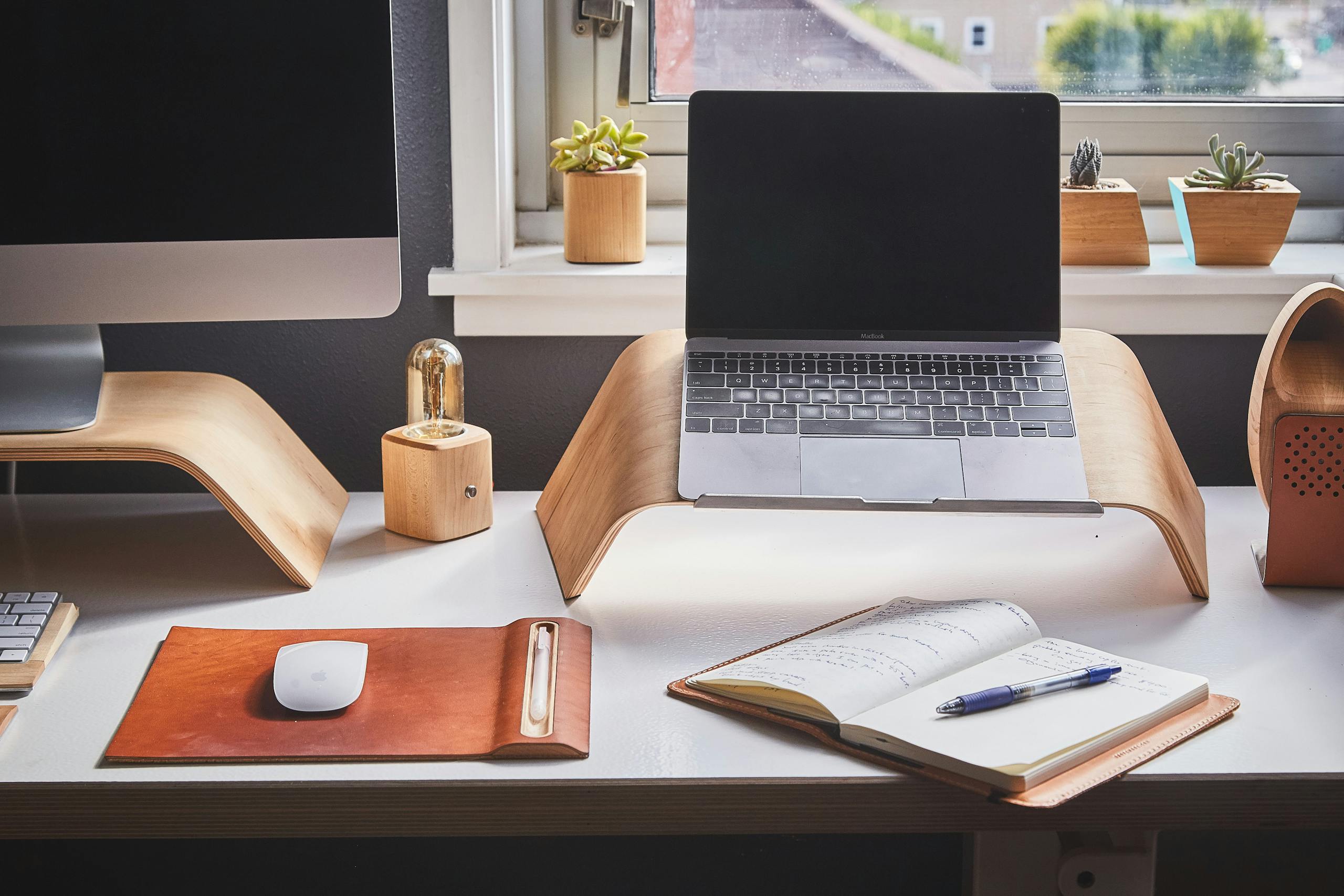 Modern workspace with technology demonstrating smart device monitoring capabilities