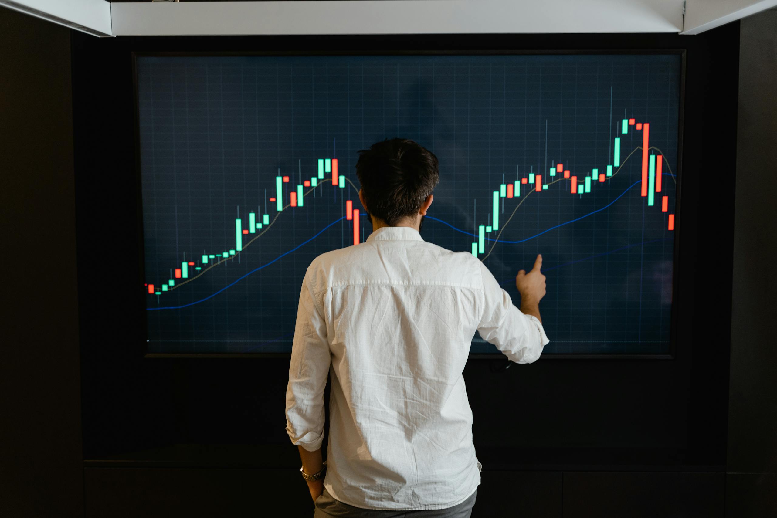 Person reviewing health and wellness metrics on digital display screen