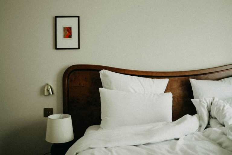 Chic bedroom with plush pillows and a stylish headboard